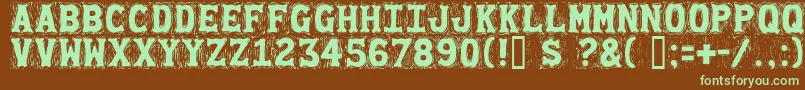 Gommogravure-fontti – vihreät fontit ruskealla taustalla