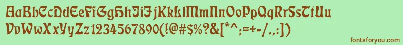 フォントEcmann – 緑の背景に茶色のフォント