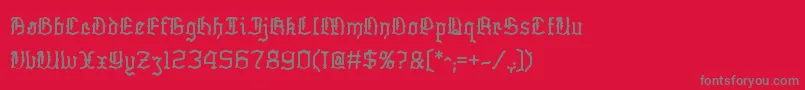 フォントSkelett – 赤い背景に灰色の文字