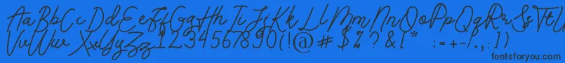 Andalusia Font – Black Fonts on Blue Background