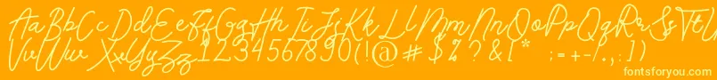 Andalusia Font – Yellow Fonts on Orange Background