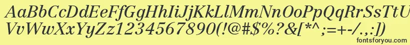 CentennialltstdItalic Font – Black Fonts on Yellow Background