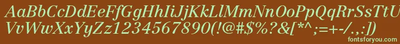 フォントCentennialltstdItalic – 緑色の文字が茶色の背景にあります。