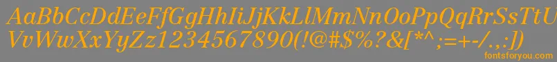 フォントCentennialltstdItalic – オレンジの文字は灰色の背景にあります。