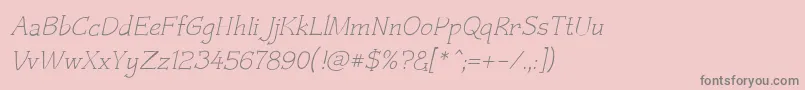 Czaristiteoblique-fontti – harmaat kirjasimet vaaleanpunaisella taustalla