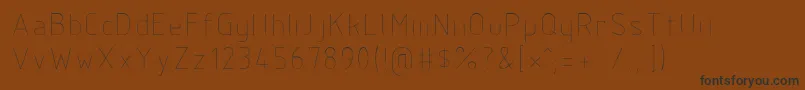 Czcionka Isocp3 – czarne czcionki na brązowym tle