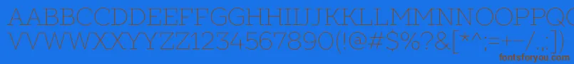 フォントSlabsThin – 茶色の文字が青い背景にあります。