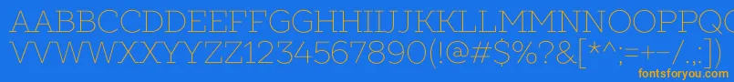 フォントSlabsThin – オレンジ色の文字が青い背景にあります。