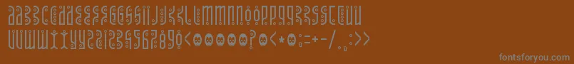 Tantrumtongue Font – Gray Fonts on Brown Background