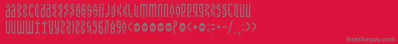 フォントTantrumtongue – 赤い背景に灰色の文字
