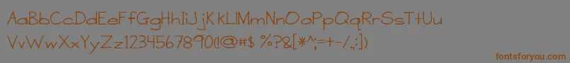 フォントASensibleArmadillo – 茶色の文字が灰色の背景にあります。