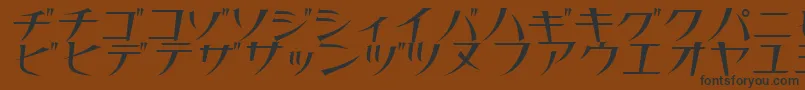 フォントThinn – 黒い文字が茶色の背景にあります