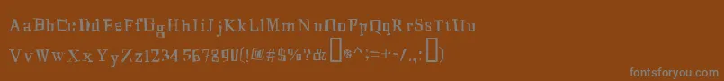 MingusRoman-Schriftart – Graue Schriften auf braunem Hintergrund