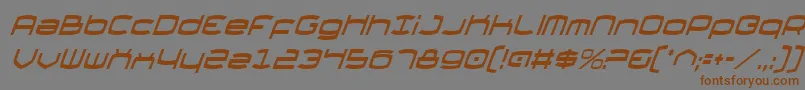 フォントThundergodCondensedItalic – 茶色の文字が灰色の背景にあります。