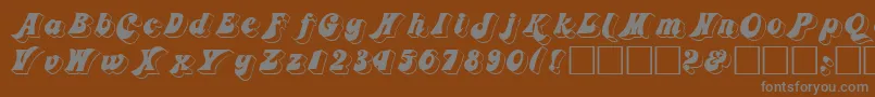 3Dfremont-fontti – harmaat kirjasimet ruskealla taustalla