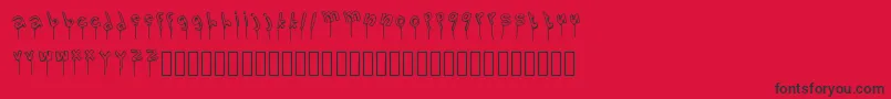LolipopFont-Schriftart – Schwarze Schriften auf rotem Hintergrund