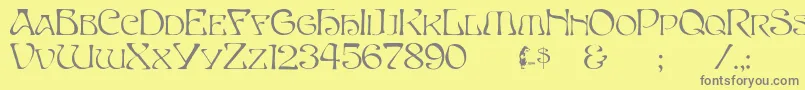 Capsbeta Font – Gray Fonts on Yellow Background