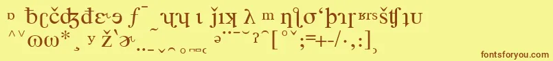 フォントTimesPhoneticAlternate – 茶色の文字が黄色の背景にあります。