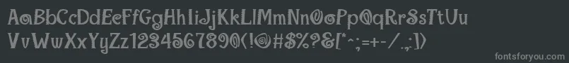 MaracaExtraboldRegular-fontti – harmaat kirjasimet mustalla taustalla