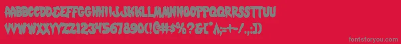 フォントMysticsinglerc – 赤い背景に灰色の文字