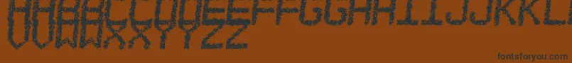 EstoreaTfb-fontti – mustat fontit ruskealla taustalla