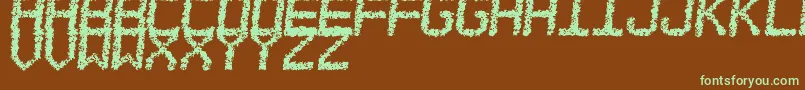 フォントEstoreaTfb – 緑色の文字が茶色の背景にあります。