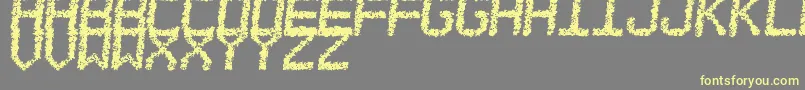 EstoreaTfb-Schriftart – Gelbe Schriften auf grauem Hintergrund