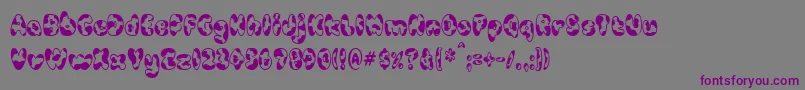 CowpokeBi Font – Purple Fonts on Gray Background