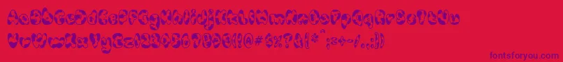 CowpokeBi Font – Purple Fonts on Red Background