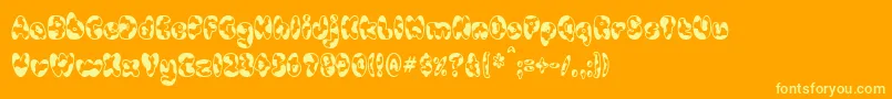 CowpokeBi Font – Yellow Fonts on Orange Background