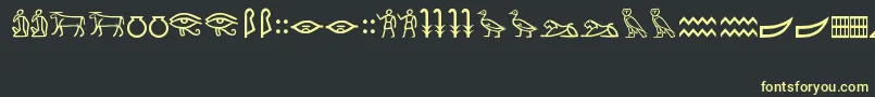 Fonte MeroiticHieroglyphics – fontes amarelas em um fundo preto