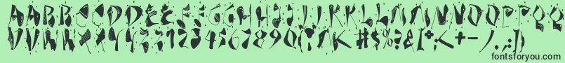 フォントDekonitials – 緑の背景に黒い文字