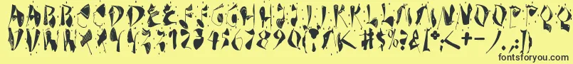 Dekonitials-fontti – mustat fontit keltaisella taustalla