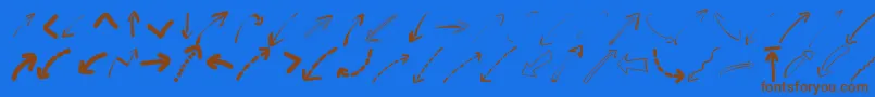 Peaxwebdesignarrows-Schriftart – Braune Schriften auf blauem Hintergrund
