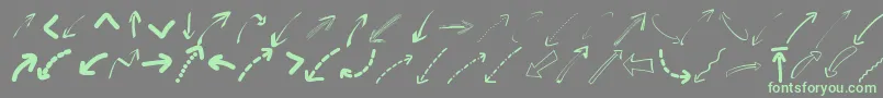 Fonte Peaxwebdesignarrows – fontes verdes em um fundo cinza