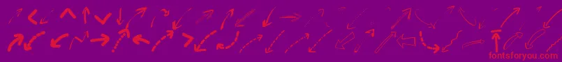 Peaxwebdesignarrows-Schriftart – Rote Schriften auf violettem Hintergrund