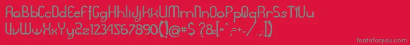 フォントAwelita – 赤い背景に灰色の文字