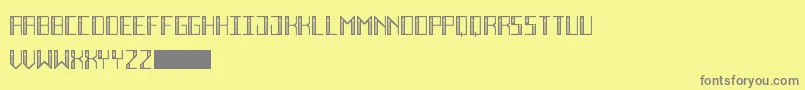DecoFutureInline Font – Gray Fonts on Yellow Background