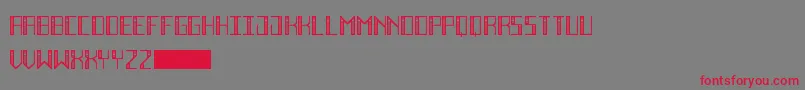 フォントDecoFutureInline – 赤い文字の灰色の背景