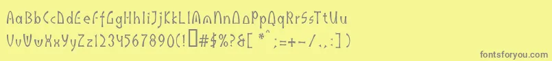 フォントIndusll – 黄色の背景に灰色の文字