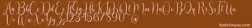AsyielaDemo-fontti – vaaleanpunaiset fontit ruskealla taustalla