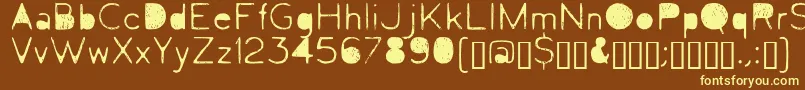 Letrograda-Schriftart – Gelbe Schriften auf braunem Hintergrund