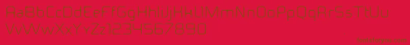 Ideomamiaguiii-Schriftart – Braune Schriften auf rotem Hintergrund