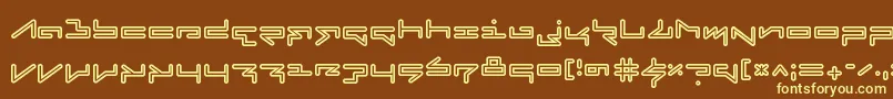 FabricateInline-fontti – keltaiset fontit ruskealla taustalla