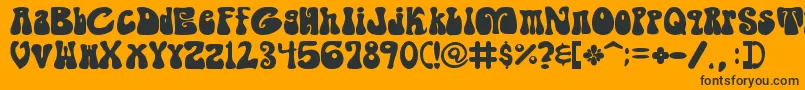 ShagadelicBold-Schriftart – Schwarze Schriften auf orangefarbenem Hintergrund