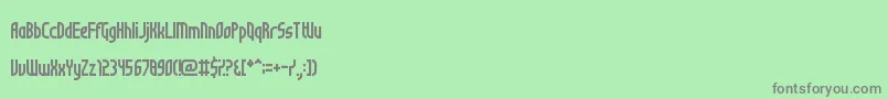 フォントNotSureIfWeirdOrJustRegular – 緑の背景に灰色の文字