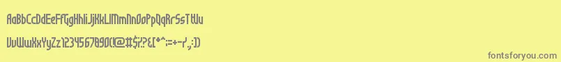 フォントNotSureIfWeirdOrJustRegular – 黄色の背景に灰色の文字