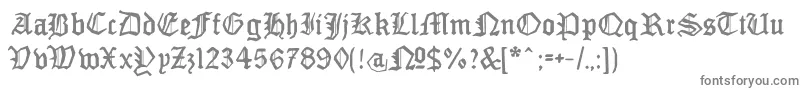 MonamourfrakturBroken-fontti – harmaat kirjasimet valkoisella taustalla