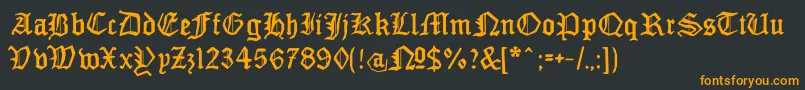 Шрифт MonamourfrakturBroken – оранжевые шрифты на чёрном фоне