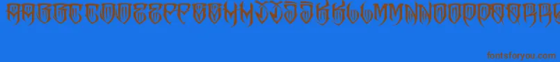 フォントJakejarkorFelona – 茶色の文字が青い背景にあります。